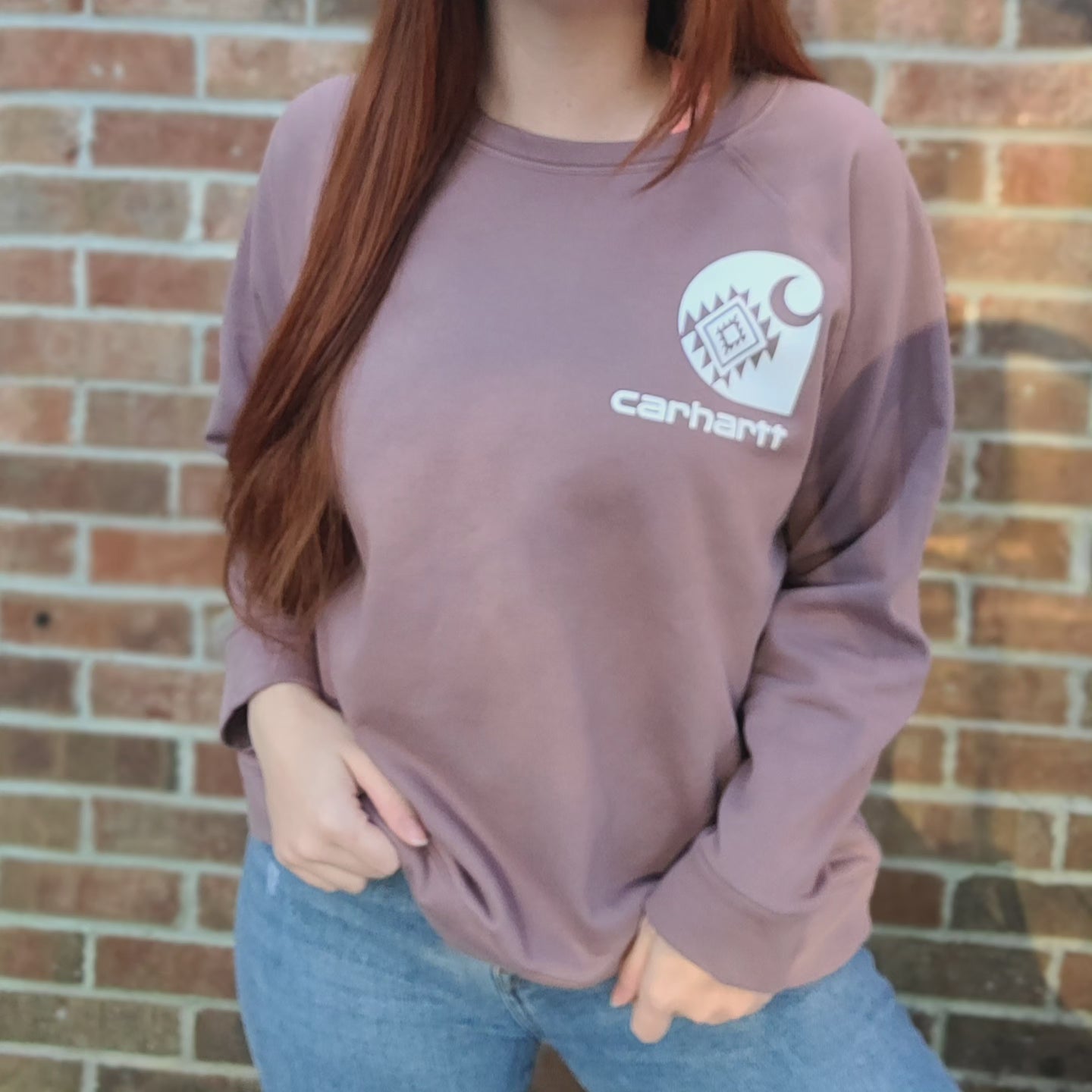 Mauve crewneck with western Carhartt logo