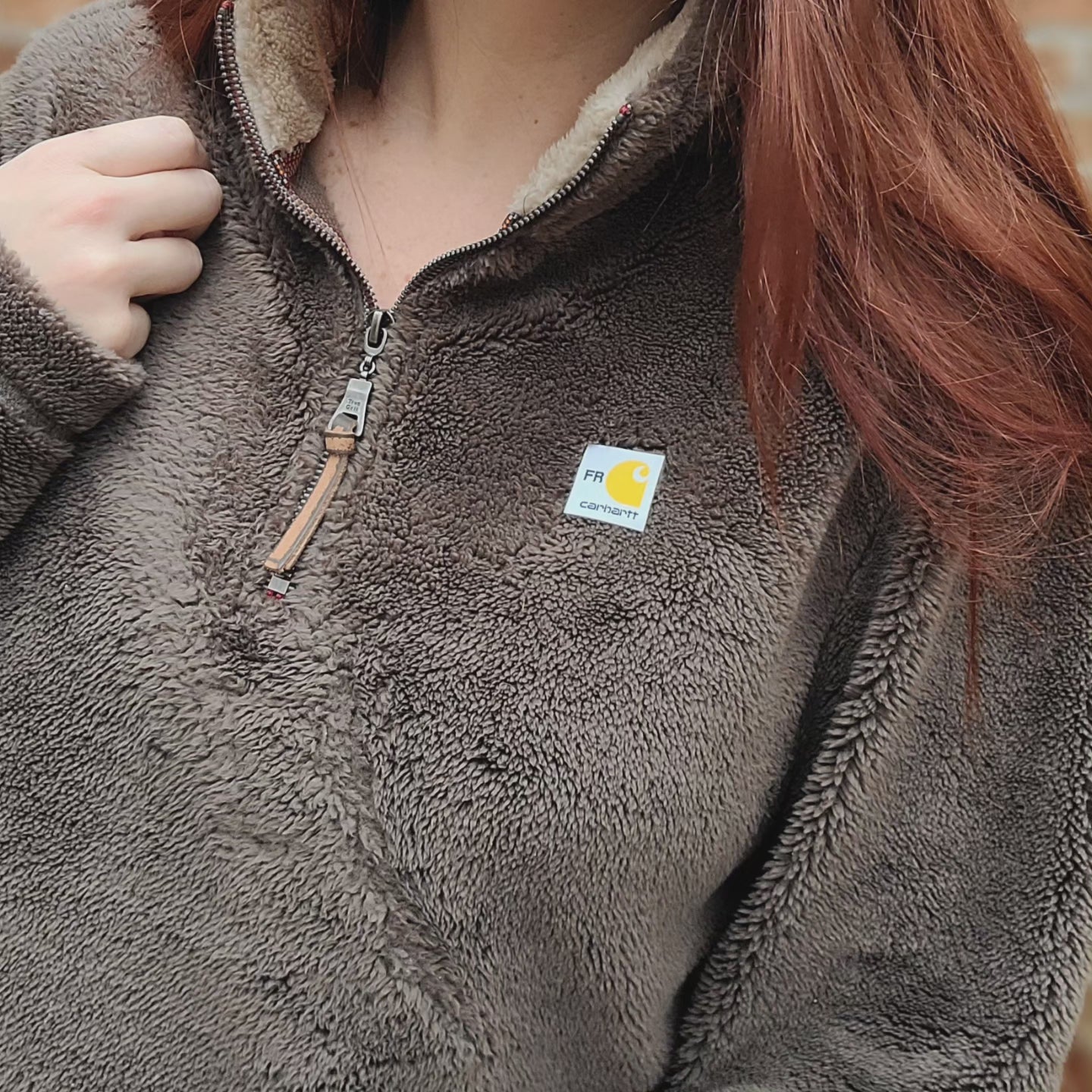 Chocolate fuzzy quarter zip with carhartt patch